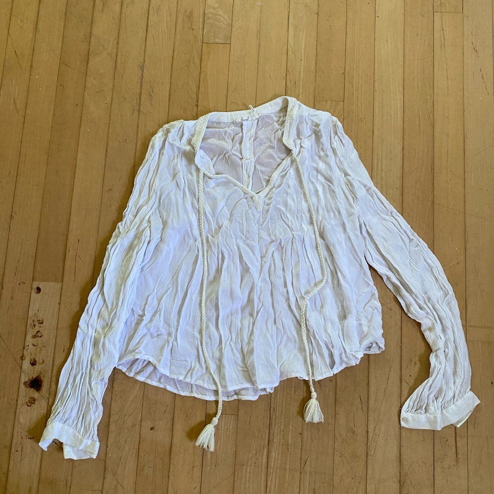 White flowy peasant top with beaded collar
